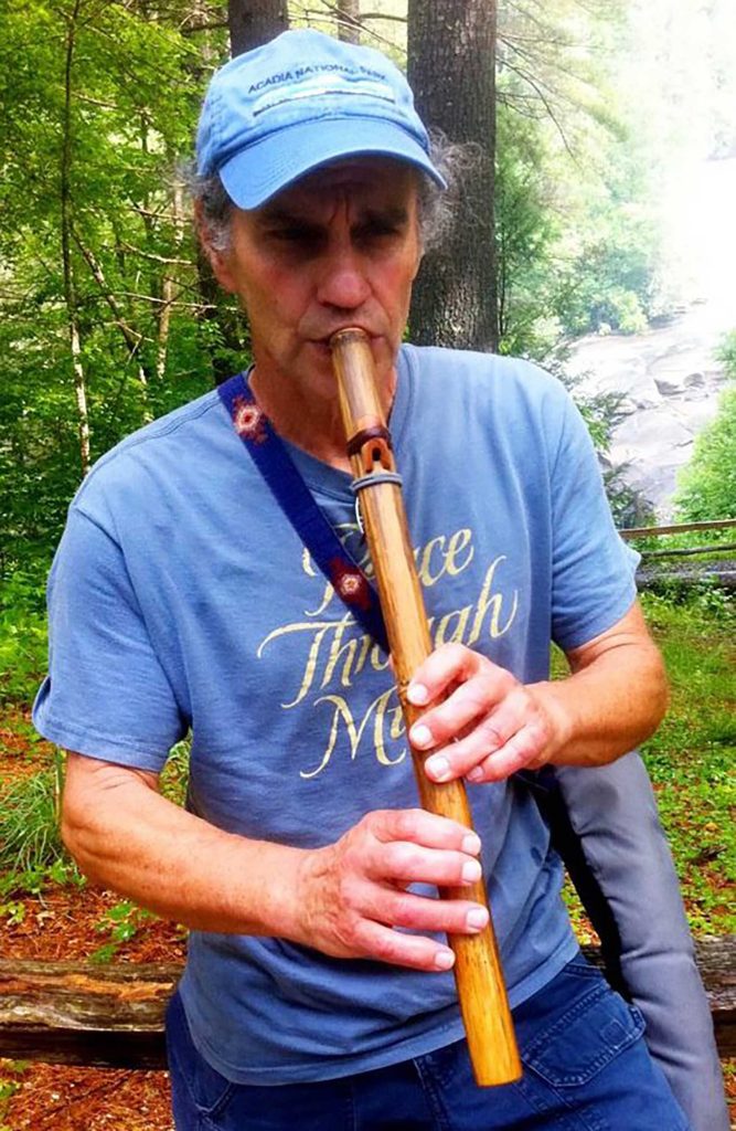 lco-elders-03-stephan-coyote-fritz-playing-flute-large